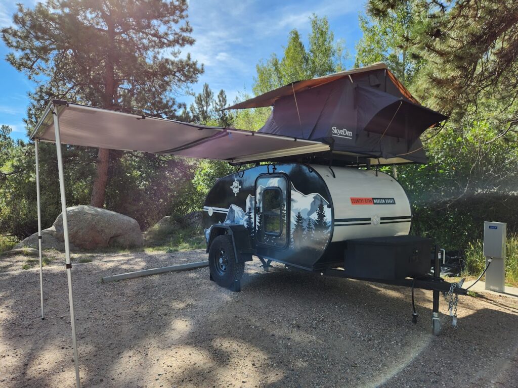 Camper trailer parked in scenic wilderness